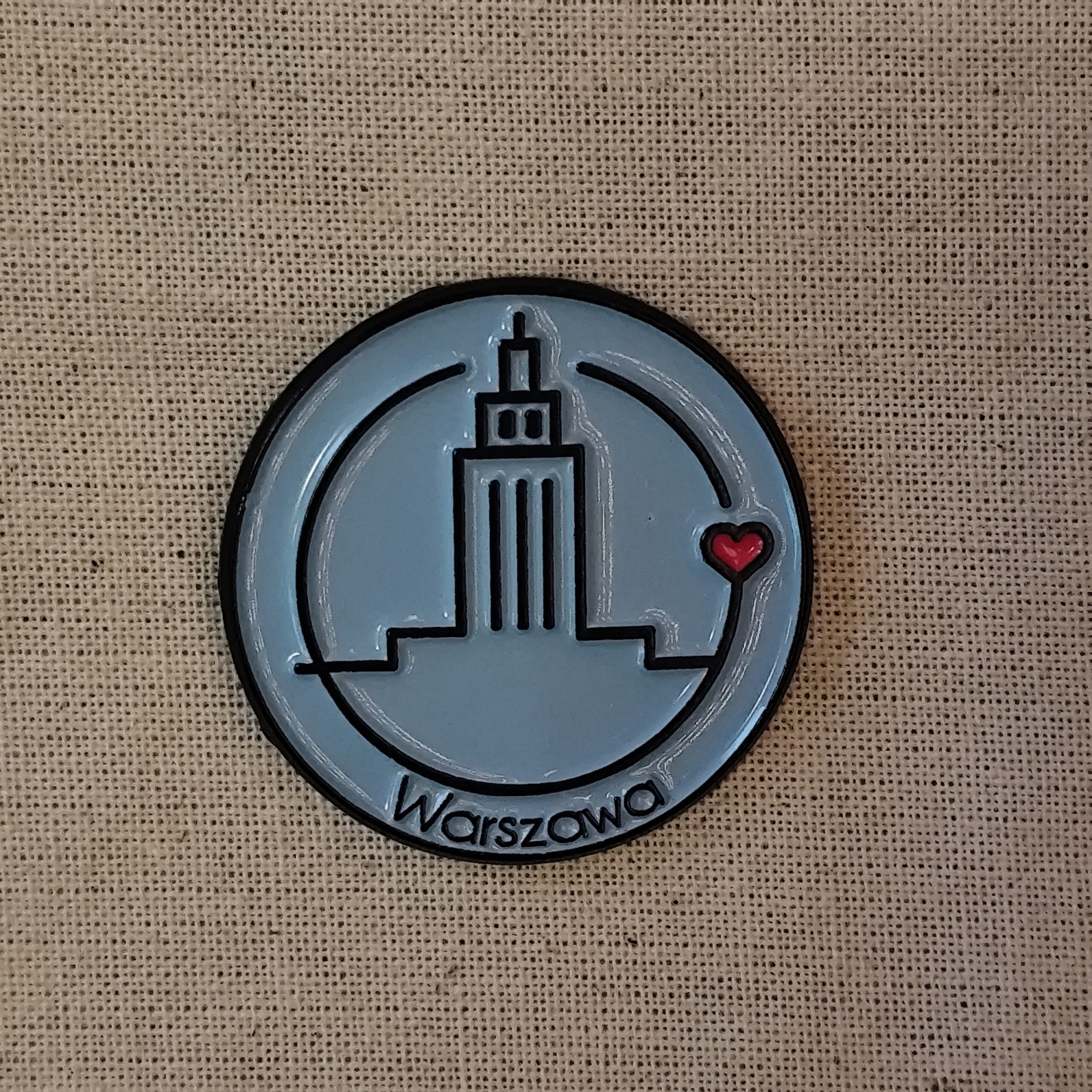 Pin warszawski niebieski